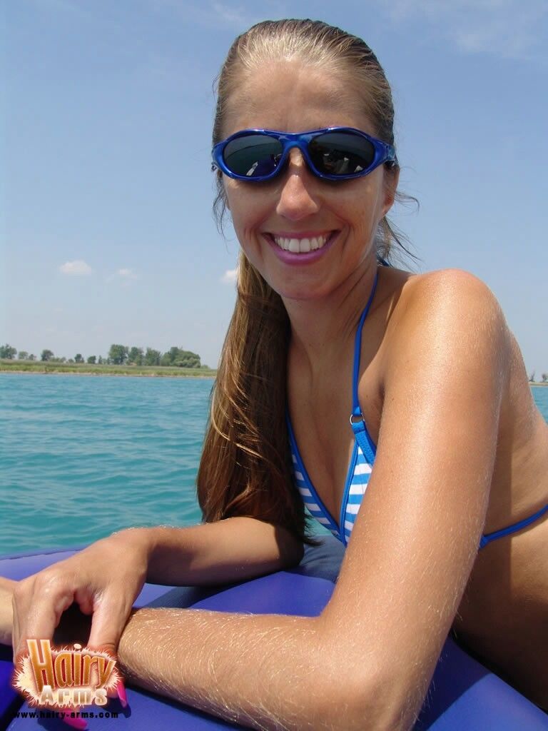 Bikini clad Lori Anderson in glasses flaunting her perfect body on the beach