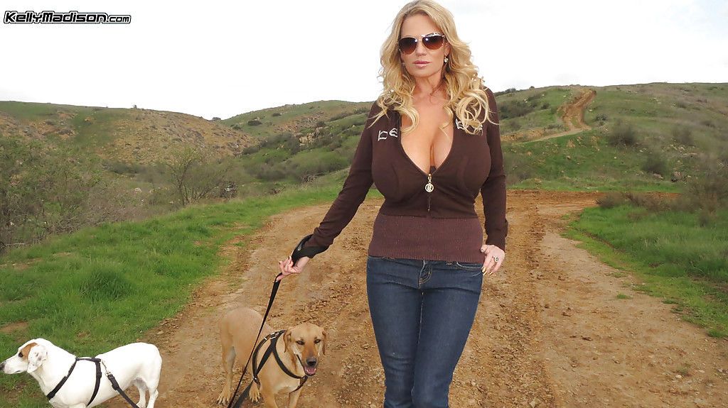Milf amateur Kelly Madison is having a nice walk with her dogs