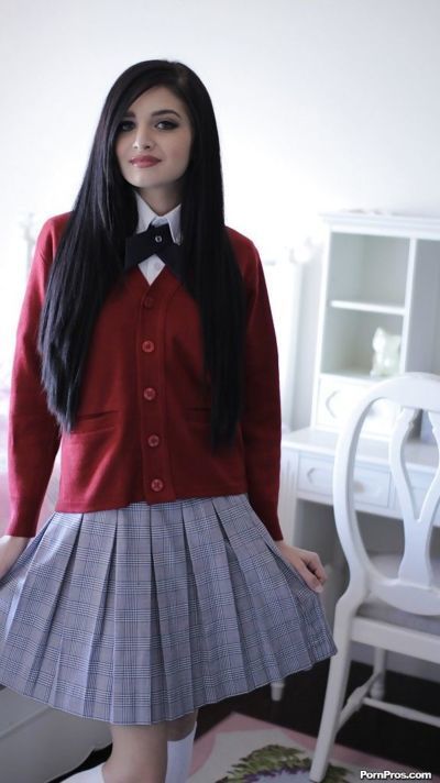 Naughty teen in school uniform Zoey Kush uncovering her tiny tits