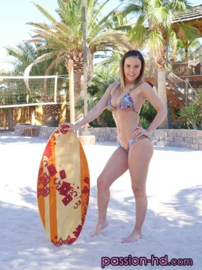 Solo girl Dillion Harper removes her bikini for nude posing at the beach