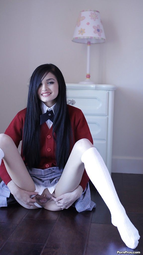 Naughty teen in school uniform Zoey Kush uncovering her tiny tits