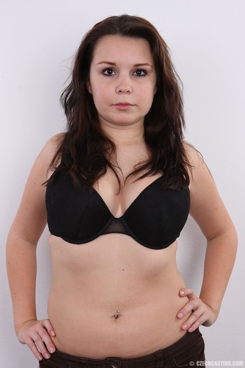 Chubby brunette takes off all her clothes to pose in the nude for first time