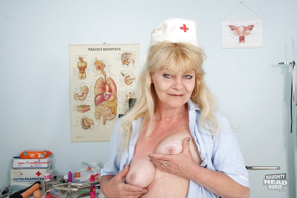 Filthy granny in nurse uniform masturbating her twat with toys
