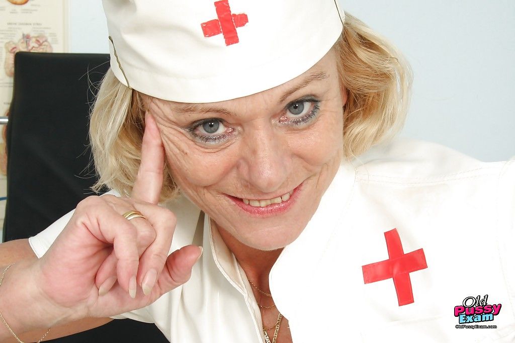 Curvaceous granny in nurse uniform masturbating her gloryhole