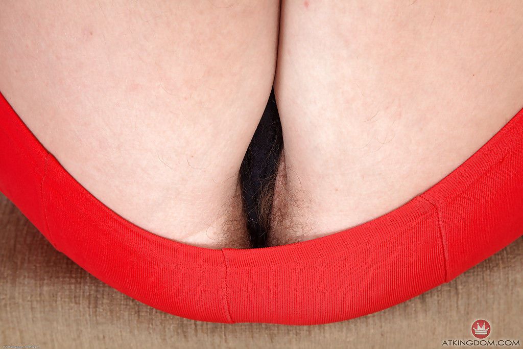 Mature woman Elle Macqueen proudly displaying her really hairy pussy