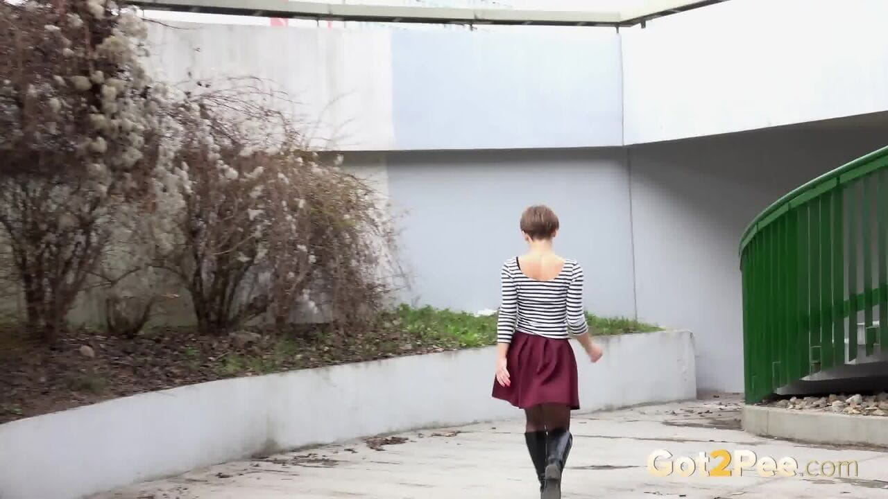 Short haired bitch Shila pulls her sexy panties down in public & takes a piss