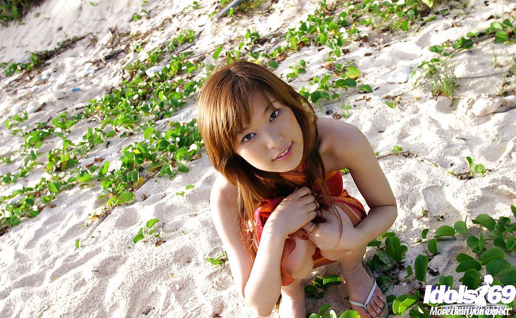 Adorable asian babe Yua Aida showcasing her tempting curves outdoor