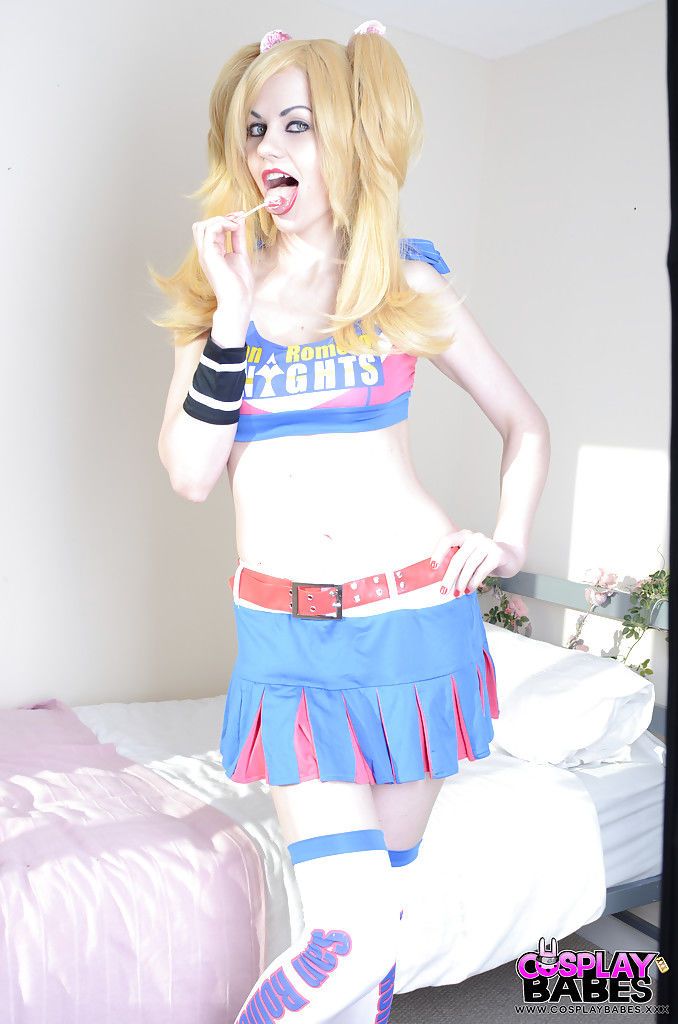 Blonde cosplay cutie Tina Fay masturbating shaved vagina with lollipop