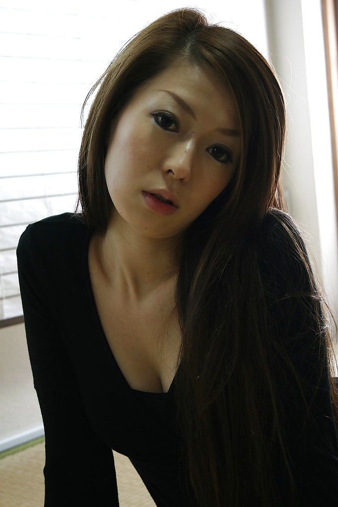 Asian babe Mai Katagiri undressing and exposing her seductive curves