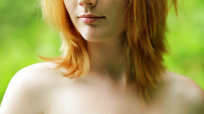 Freckled redhead model Lynette..