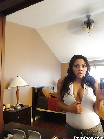 Sultry Latina female Adriana Luna snapping selfies of her big natural titties